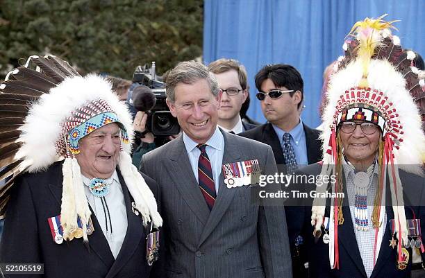 Prince Charles On A Royal Tour Of Canada Attending A Welcome Ceremony In Regina And Laughing With First Nation Chiefs Outside The Legislative...