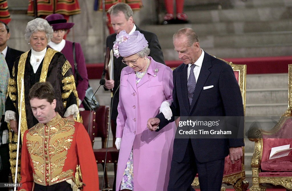 Queen Holds Prince Philip Arm