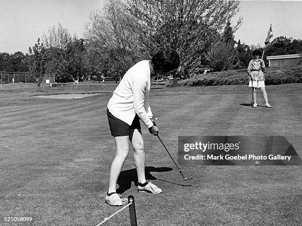 Women playing golf, May 4, 1974.
