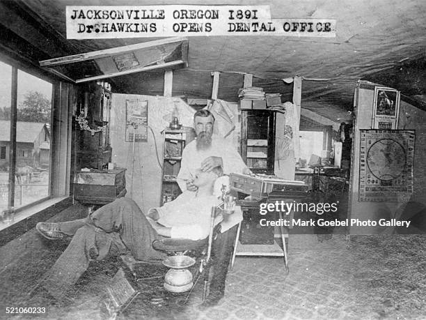 Dentist working on patient in Jacksonville Oregon, early 1890s.