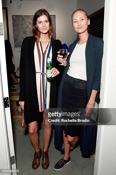 Models Beth Ostendorf and Nadya Panchenko attend the Photo Femmes Exhibition Opening at De Re Gallery, featuring the work of Ashley Noelle, Bojana...