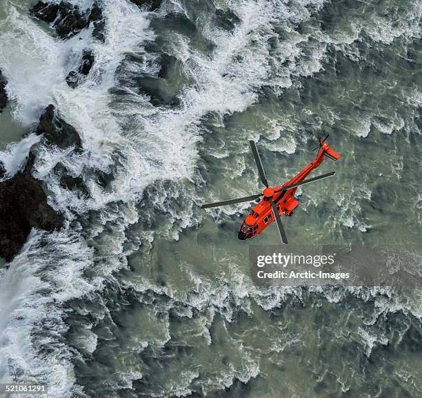 helicopter flying over waterfalls, iceland - gullfoss falls stock-fotos und bilder
