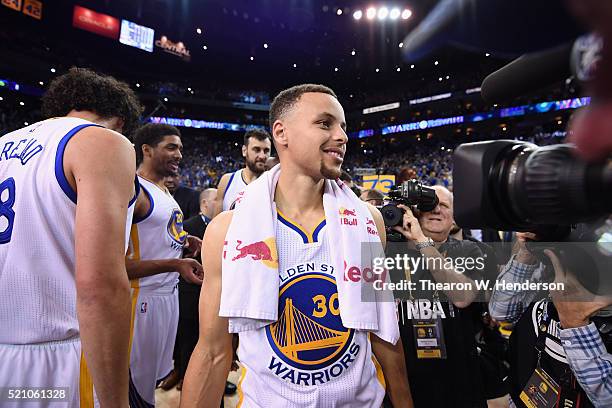 Stephen Curry of the Golden State Warriors reacts after the Warriors defeated the Memphis Grizzlies 125-104 at ORACLE Arena on April 13, 2016 in...