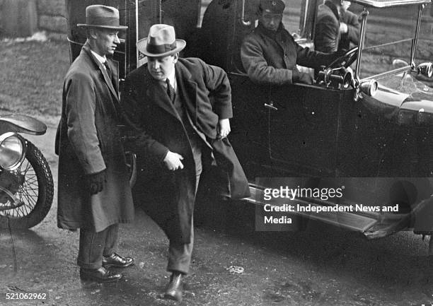 Gen. Michael Collins with Col. Joe O'Reilly arriving at Earlsforth for First sitting of Dail Eireinn Circa 1919 .