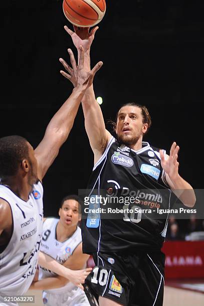 Toto Forray of Dolomiti Energia competes with Dexter Pittman and Abdul Gaddy of Obiettivo Lavoro during the LegaBasket match between Virtus Obiettivo...
