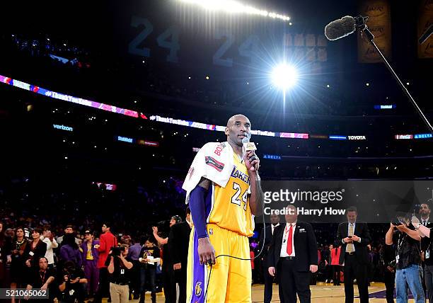 Kobe Bryant of the Los Angeles Lakers addresses the crowd after scoring 60 points in his final NBA game at Staples Center on April 13, 2016 in Los...