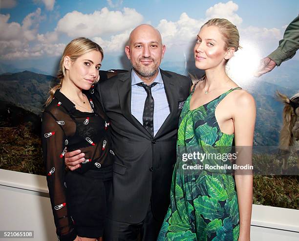 Kate, owner of De Re Gallery Steph Sebbag, and model Taylor Reynolds attend the Photo Femmes Exhibition Opening at De Re Gallery, featuring the work...