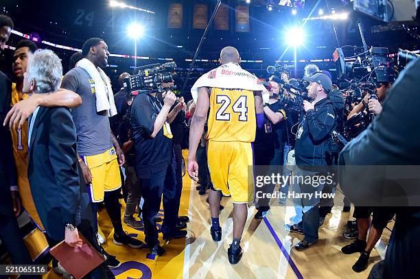 Kobe Bryant of the Los Angeles Lakers walks towards the tunnel after scoring 60 points against the Utah Jazz at Staples Center on April 13, 2016 in...