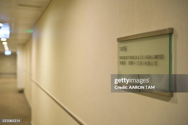 Sign belonging to Panama law firm Mossack Fonseca is seen at the entrance of its Hong Kong office on April 14, 2016. The so-called Panama Papers,...