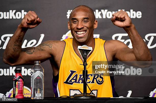 Kobe Bryant of the Los Angeles Lakers smiles during the post game news conference after scoring 60 points in the final game of his NBA career at...