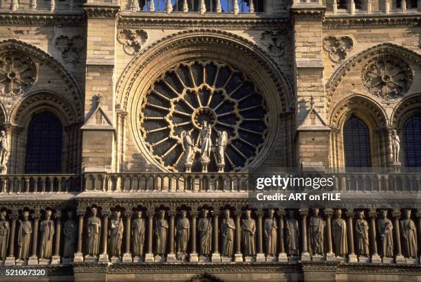 notre-dame cathedral in paris: facade rose window and galerie des rois - galerie stock pictures, royalty-free photos & images