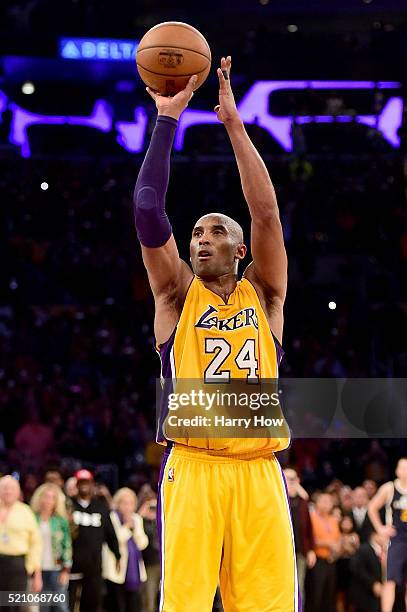 Kobe Bryant of the Los Angeles Lakers takes his final shot - a free throw - late in the fourth quarter to score his 60th point against the Utah Jazz...