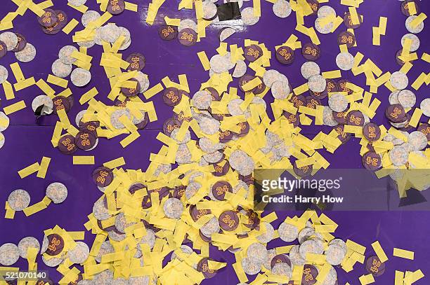 Confetti is seen after Kobe Bryant of the Los Angeles Lakers walks off the court after scoring 60 points in his final NBA game at Staples Center on...