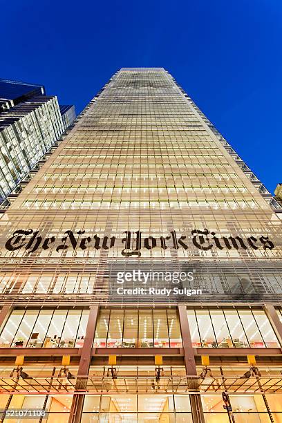 new york times building at dusk - new york times building stock pictures, royalty-free photos & images