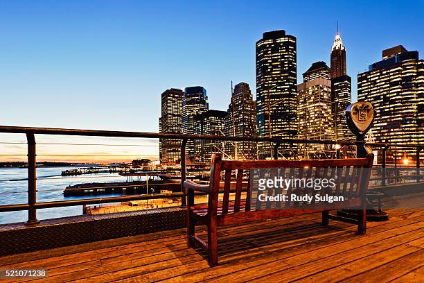 south street seaport and lower manhattan skyline at dusk - south street seaport stockfoto's en -beelden
