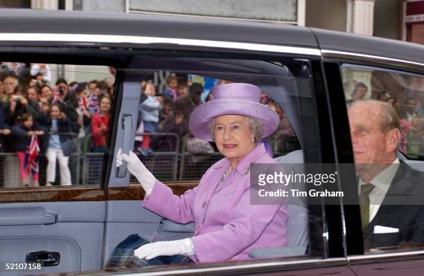 Queen Elizabeth Ll Leaving The Highgate Hill Murugan Hindu Temple In Archway In Her New Bentley State Limousine Car With Prince Philip. This Is The...