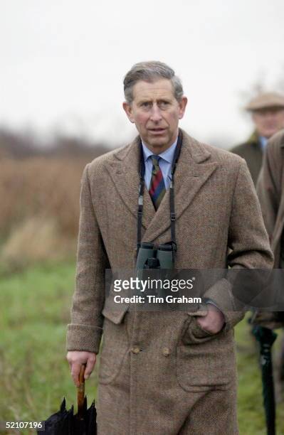 Prince Charles, Patron Of The Wildlife Trusts, Visiting The Norfolk Wildlife Trust, Hickling Broad, Norfolk Walking With Binoculars.
