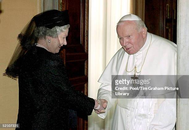 The Queen Shaking Hands With Pope John Paul II At The Vatican In Rome