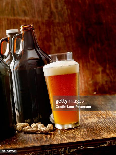 bier growlers - beer nuts stock-fotos und bilder