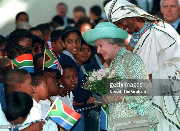 The Queen Meeting Some Young Children During Her Walkabout With Nceba Faku The First Black Mayor Of Port-elizabeth, South Africa.