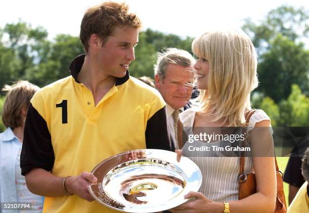 Prince William Posing With Model Claudia Schiffer After She Presented Him With A Trophy For His Team Winning The Porcelanosa Challenge Cup Polo Match...