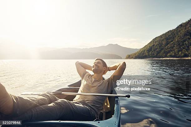 einsamkeit in natur ist glückseligkeit - boat on water stock-fotos und bilder