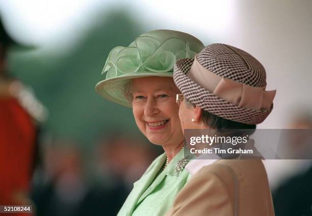 The Queen Shares A Joke With Mrs Goncz, Wife Of The President Of Hungary, Whilst They Watch The Ceremonial Welcome At The Home Park, Windsor.