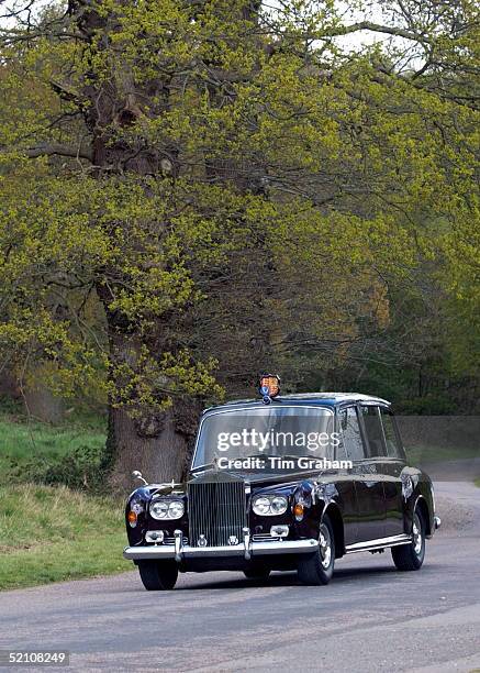 The Royal Family Back At Work During Their Period Of Mourning. The Queen Travelling In Her Rolls Royce Car To The Royal School In Windsor Great Park.