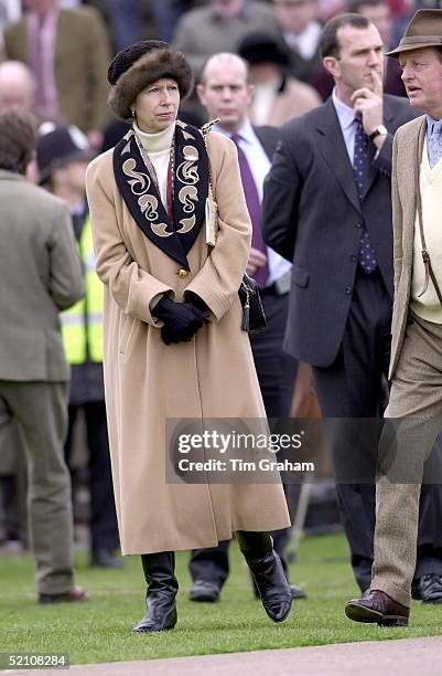 Princess Anne, The Princess Royal, With Andrew Parker-bowles At Cheltenham Races.between Them In Background Two Police Bodyguards