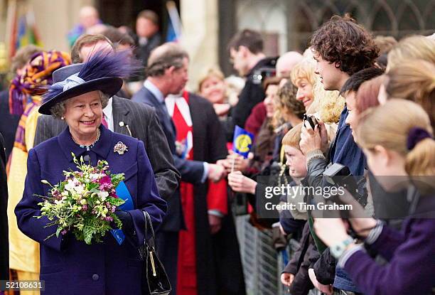 The Queen At Westminster Abbey In London For The Commonwealth Observance Service. With Prince Charles Behind Her She Went On A Walkabout Among The...