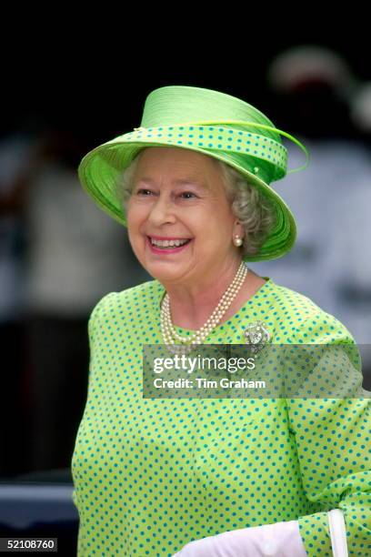 Queen Elizabeth Ll Laughing Whilst Attending The Governor General's Garden Fair At The Half Moon Hotel To See Jamaican Produce And Listen To Jamaican...