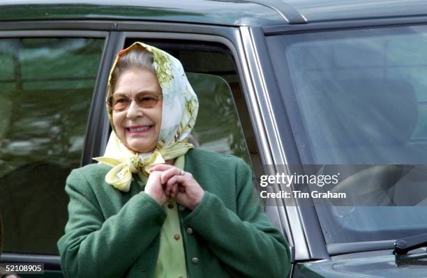 Queen Elizabeth II Relaxed And Laughing In Headscarf And Casual Clothes Watching Her Husband Prince Philip Taking Part In The International Driving...