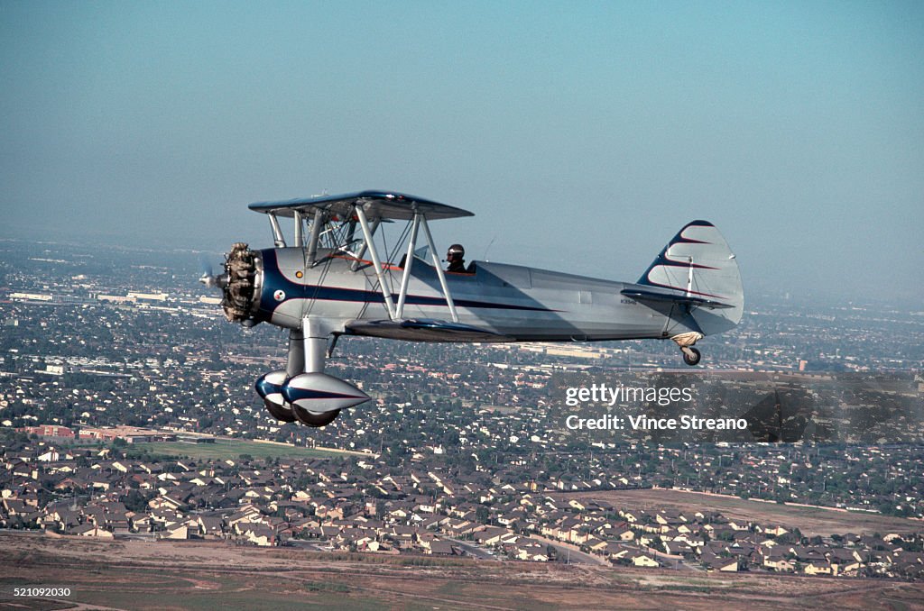 Open Cockpit Biplane in Flight