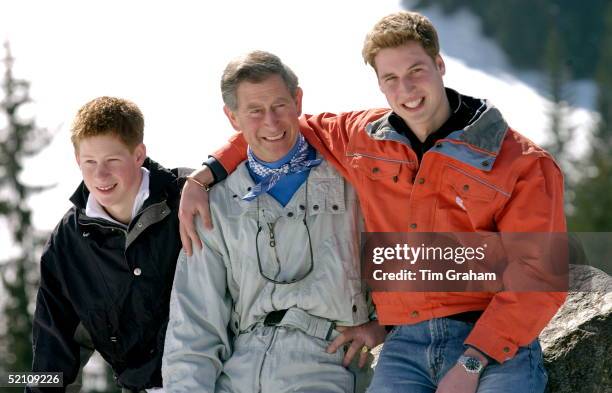 Prince Charles Smiling With His Teenage Sons Prince William And Prince Harry At The Start Of Their Annual Skiing Holidays. Prince William Is Showing...