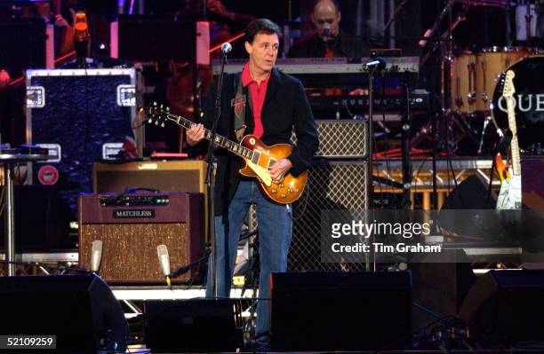 Musician Paul Mccartney Playing Guitar And Singing At The "party At The Palace" Pop Concert Held In The Grounds Of Buckingham Palace To Celebrate The...