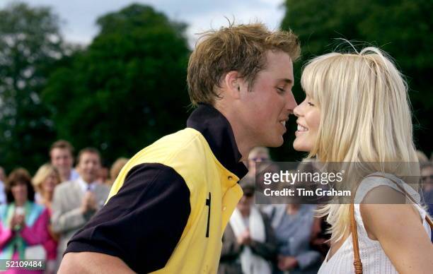 Prince William Kisses Model Claudia Schiffer Who Presented Him With His Prize For Winning At The Porcelanosa Challenge Cup Polo Match At Ashe Park To...