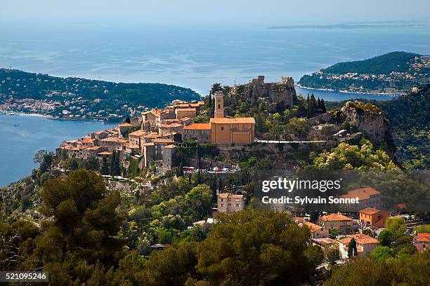 village and coast in eze, france - eze village stock pictures, royalty-free photos & images