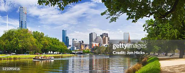 yarra river and city center seen from birrarung marr park - boat melbourne stock-fotos und bilder