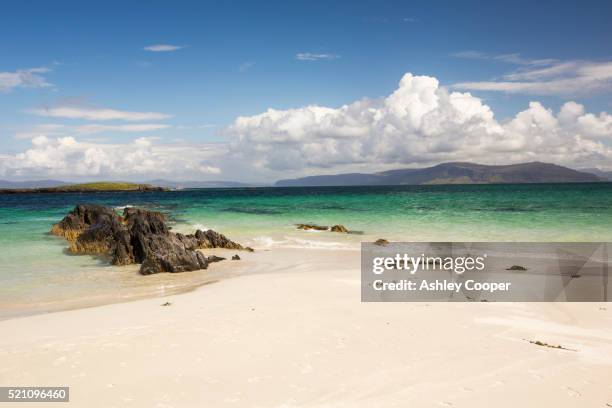 white sand beaches and clean seas on the north coast of iona, off mull, scotland, uk. - scotland beach stock pictures, royalty-free photos & images
