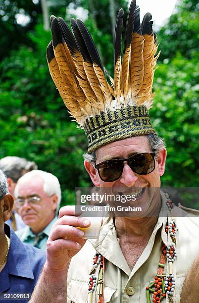 Prince Charles In Guyana, South America, Visiting Iwokrama Rainforest Wearing Garlands And Head-dress Of Hawk Feathers And Palm Leaves With Which He...