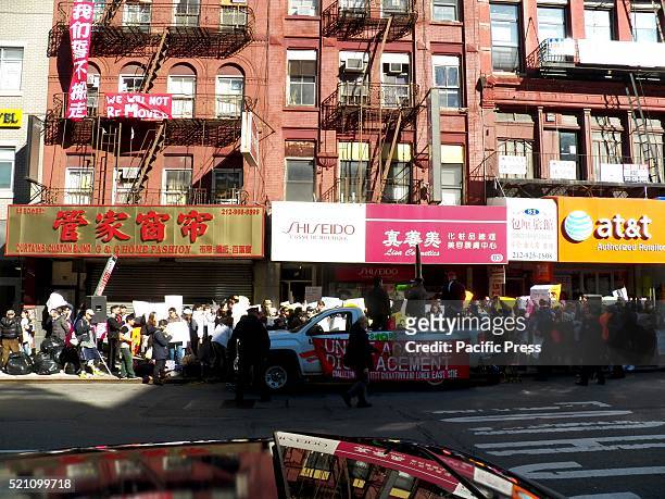 The protesters join the event organized by Coalition to Protect Chinatown and Lower East Side to help the residents of 83-85 Bowery in their fight to...
