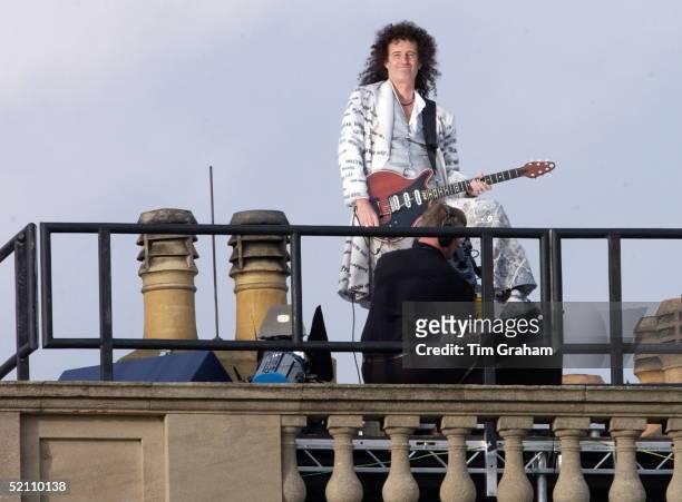 The National Anthem Played By Guitarist Brian May From The Roof Of The Palace During "party At The Palace" In The Gardens Of Buckingham Palace