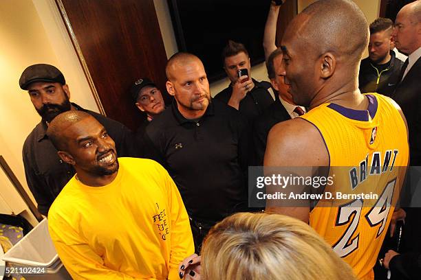 Rapper, Kanye West talks to Kobe Bryant of the Los Angeles Lakers after the game on April 13, 2016 at Staples Center in Los Angeles, California. NOTE...