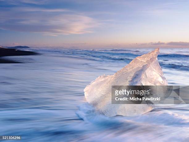 iceberg in the surf - beach vibes stock pictures, royalty-free photos & images