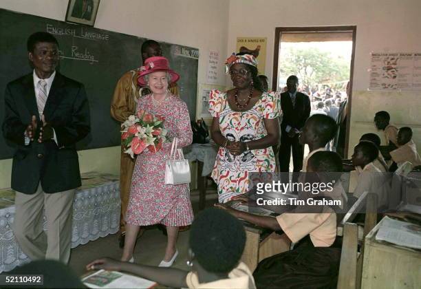 The Queen Visiting A Classroom During Her Visit To The Wireless Cluster Junior School In Accra, Ghana.