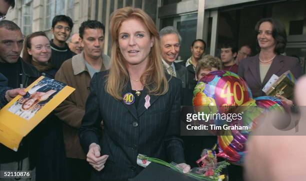 Sarah, The Duchess Of York Wearing A 40th Birthday Badge And Visiting The Teenage Cancer Trust At University College Hospital In London. Her Sister...