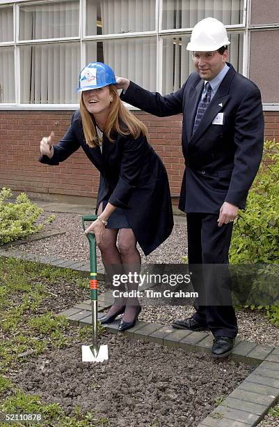 Sarah Duchess Of York Wearing A Hard Hat And Using A Spade To Open The New Parental Accommodation In The Neo Natal Unit At The Royal Bolton Hospital...