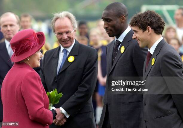 Queen Elizabeth II Smiling As She Chats With England World Cup Team Manager Sven Goran -eriksson And World Cup Team Member Sol Campbell On His Left...