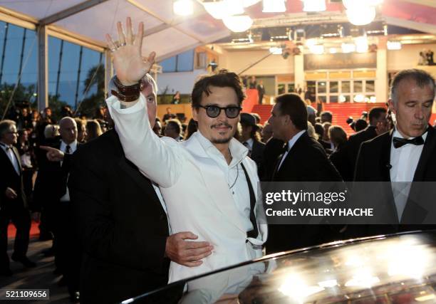 Actor Johnny Depp leaves after the screening of "Pirates of the Caribbean : On Stranger Tides" presented out of competition at the 64th Cannes Film...