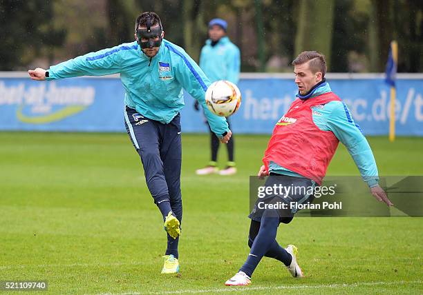 Vedad Ibisevic passes the ball next to Peter Pekarik of Hertha BSC beforebei during the training of Hertha BSC on april 14, 2016 in Berlin, Germany.